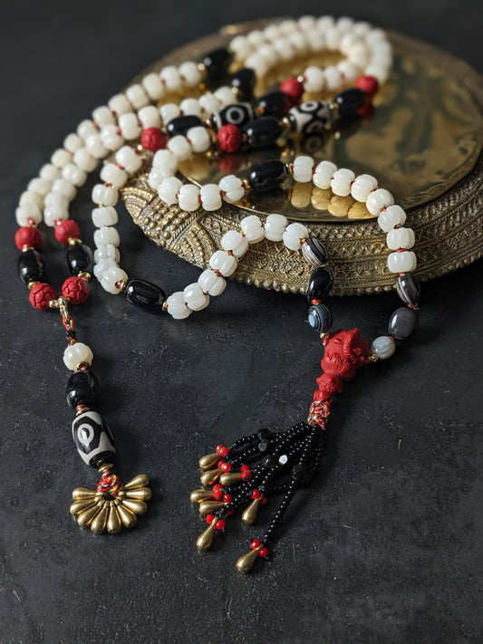 Mala traditionnel en onyx, perles bodhi et éléphant